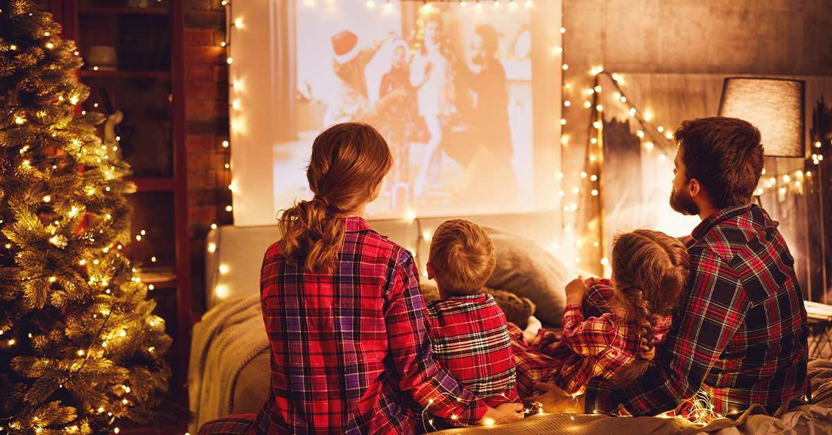 A family watches a holiday movie together.