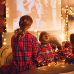 A family watches a holiday movie together.