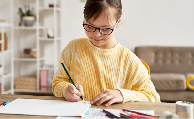 A young student does homework.