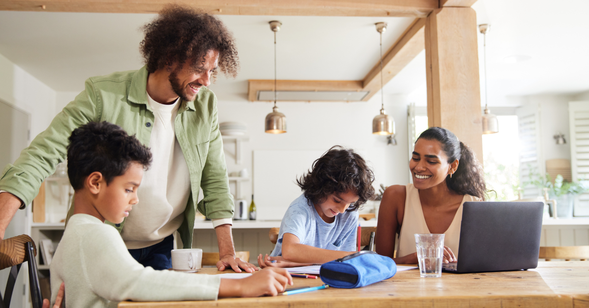 A family homeschooling together.