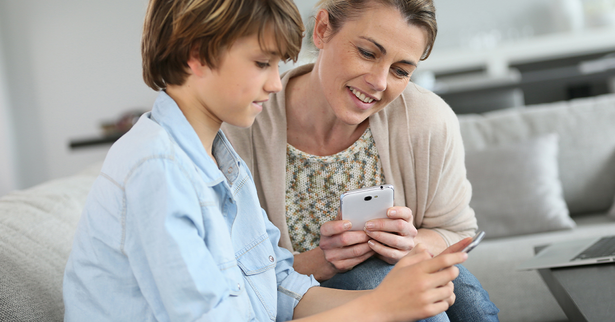 A parent talks to their child about screen time.