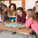 A family playing a board game together.