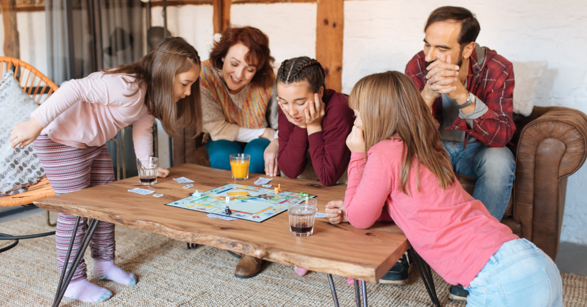 A family playing a board game together.