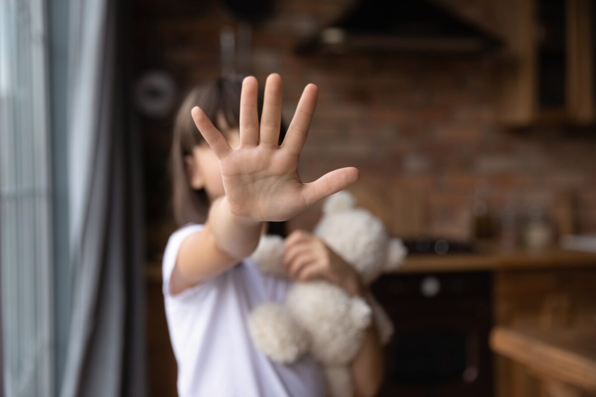 A student holding their handout.