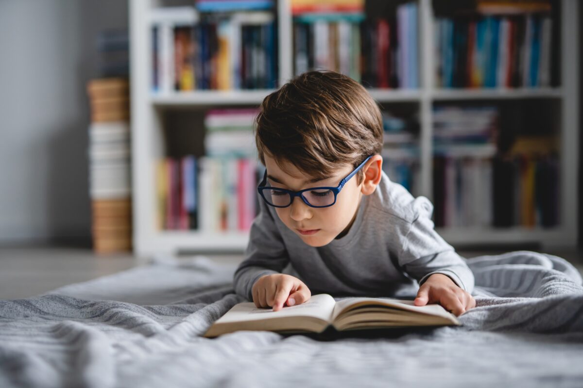 A young student reading.