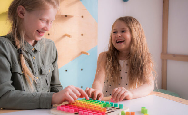 Two students working on a math project together