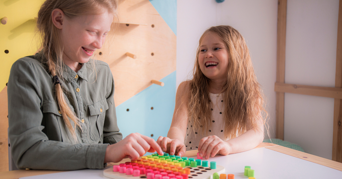 Two students working on a math project together