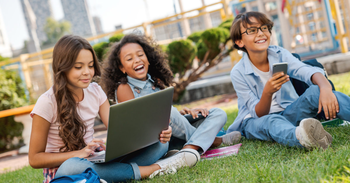 A small group of students studying outside