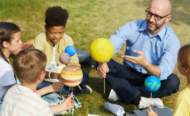 A homeschool group learning outside