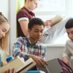 A group of students doing homework