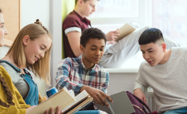 A group of students doing homework