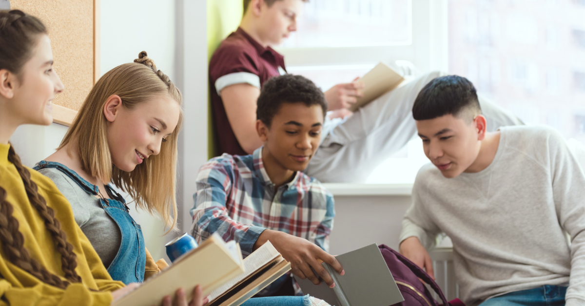 A group of students doing homework