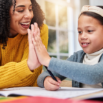 A mother and daughter homeschooling together.