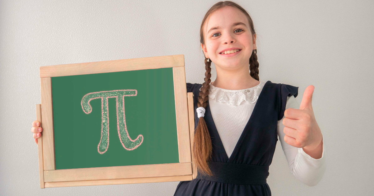 A student holding a chalkboard with the symbol for pi on it