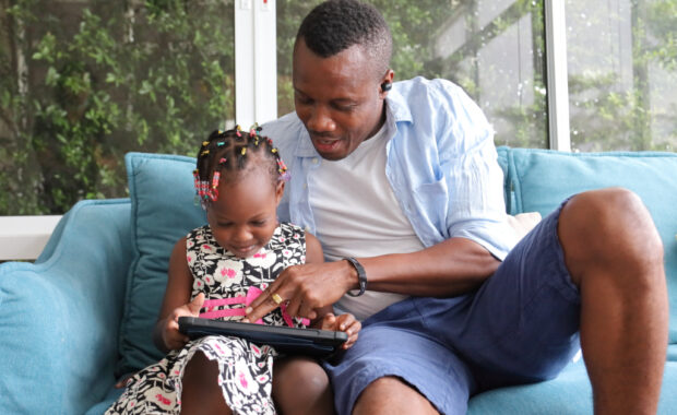 A father and daughter learning together