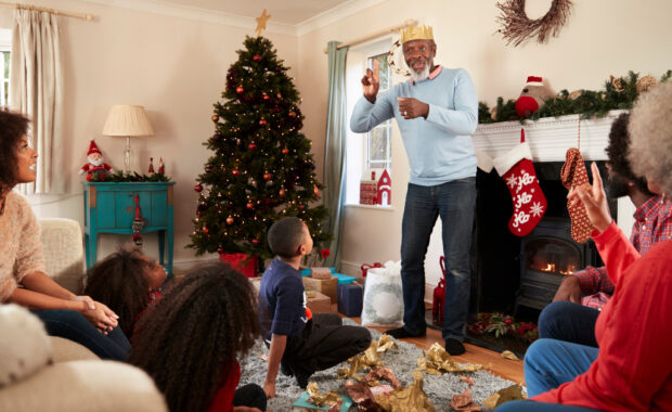 A family playing a holiday-themed game together