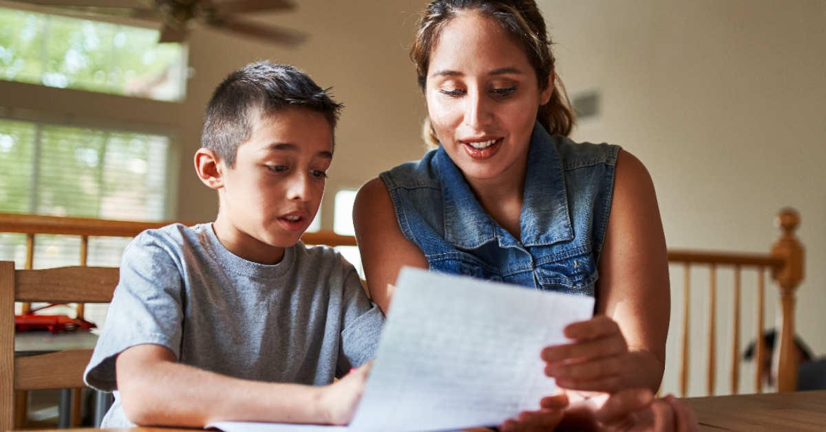 A student looking at a piece of paper