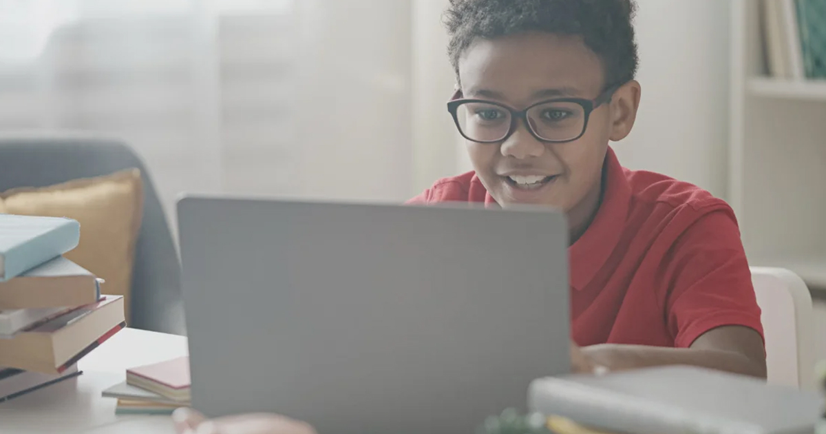 A student working on a laptop computer