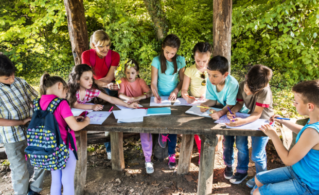 A group of students learning outside