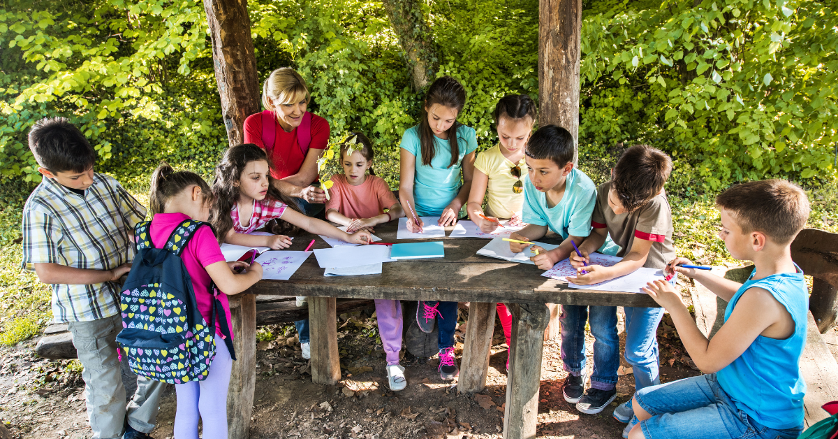 A group of students learning outside