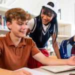 A group of students working on a project together