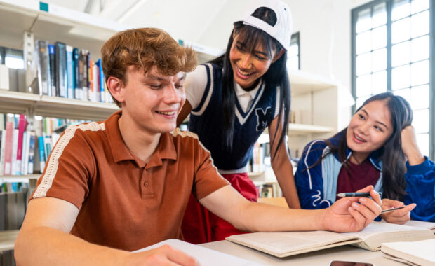 A group of students working on a project together