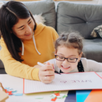 A teacher and student studying together