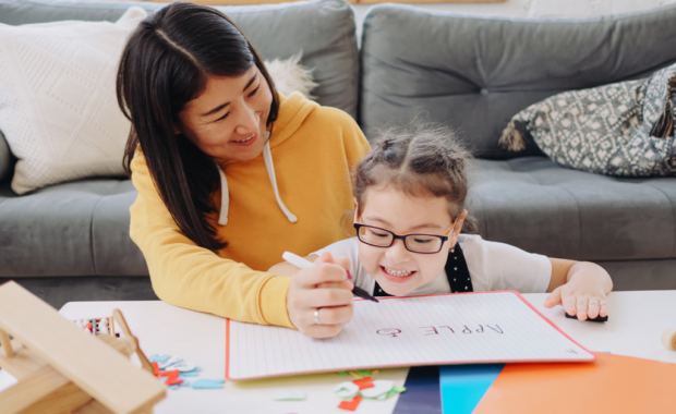 A teacher and student studying together
