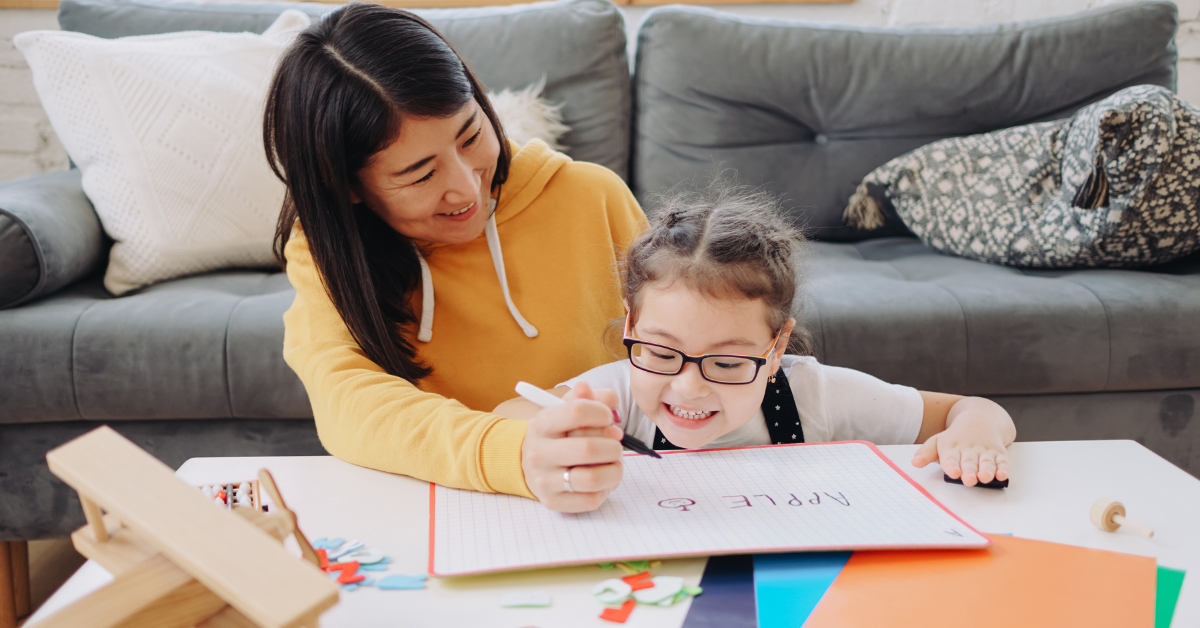 A teacher and student studying together