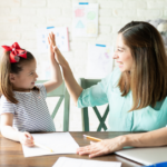 A homeschool teacher and student doing homework together
