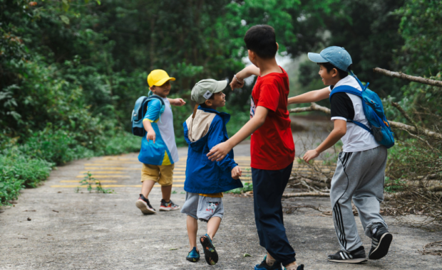 A family walking on a nature path