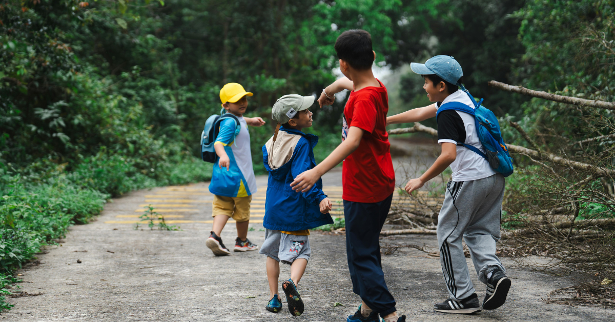 A family walking on a nature path