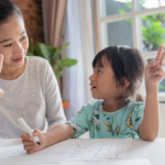 A teacher and student working on math