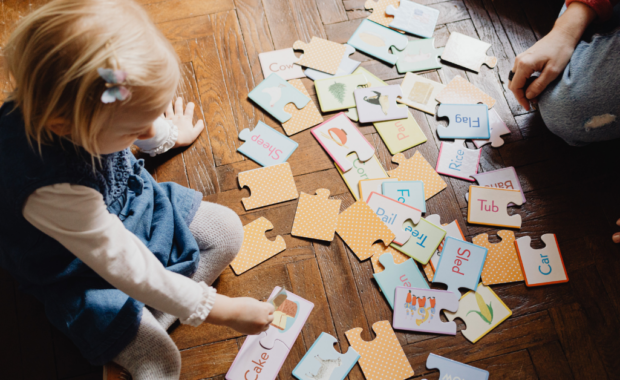 A young student playing a memory game