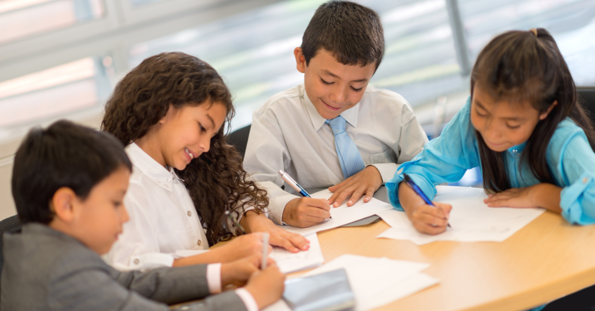 Students working on a grammar project together