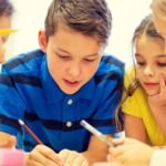 A group of students working on a writing assignment