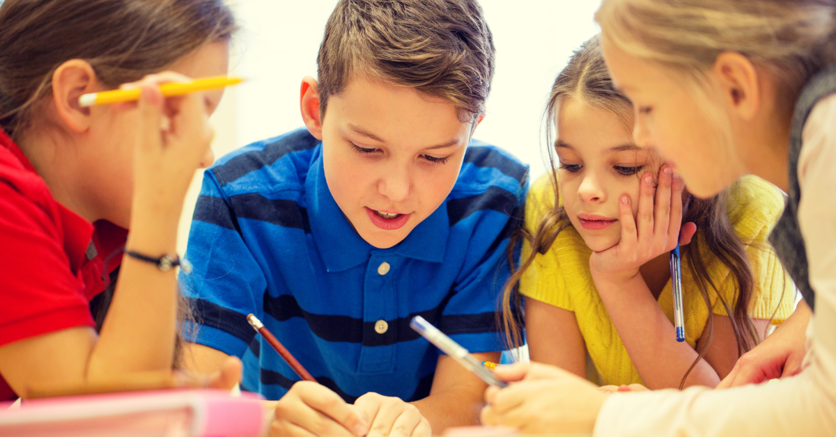 A group of students working on a writing assignment