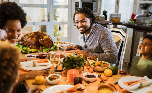 A family eating a Thanksgiving dinner together